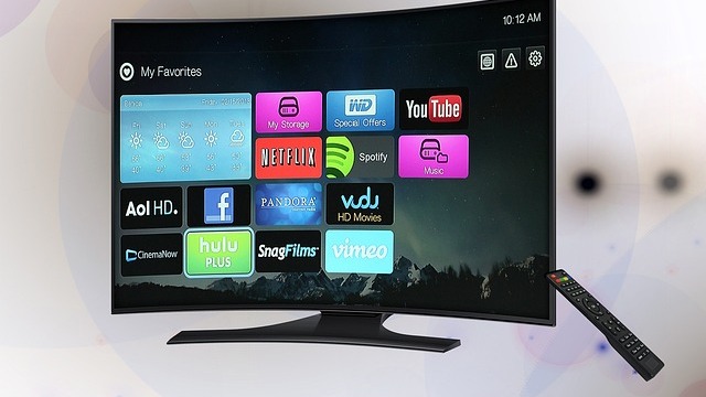 Team in office using Unifi Ultra Free Smart TV for video conference.