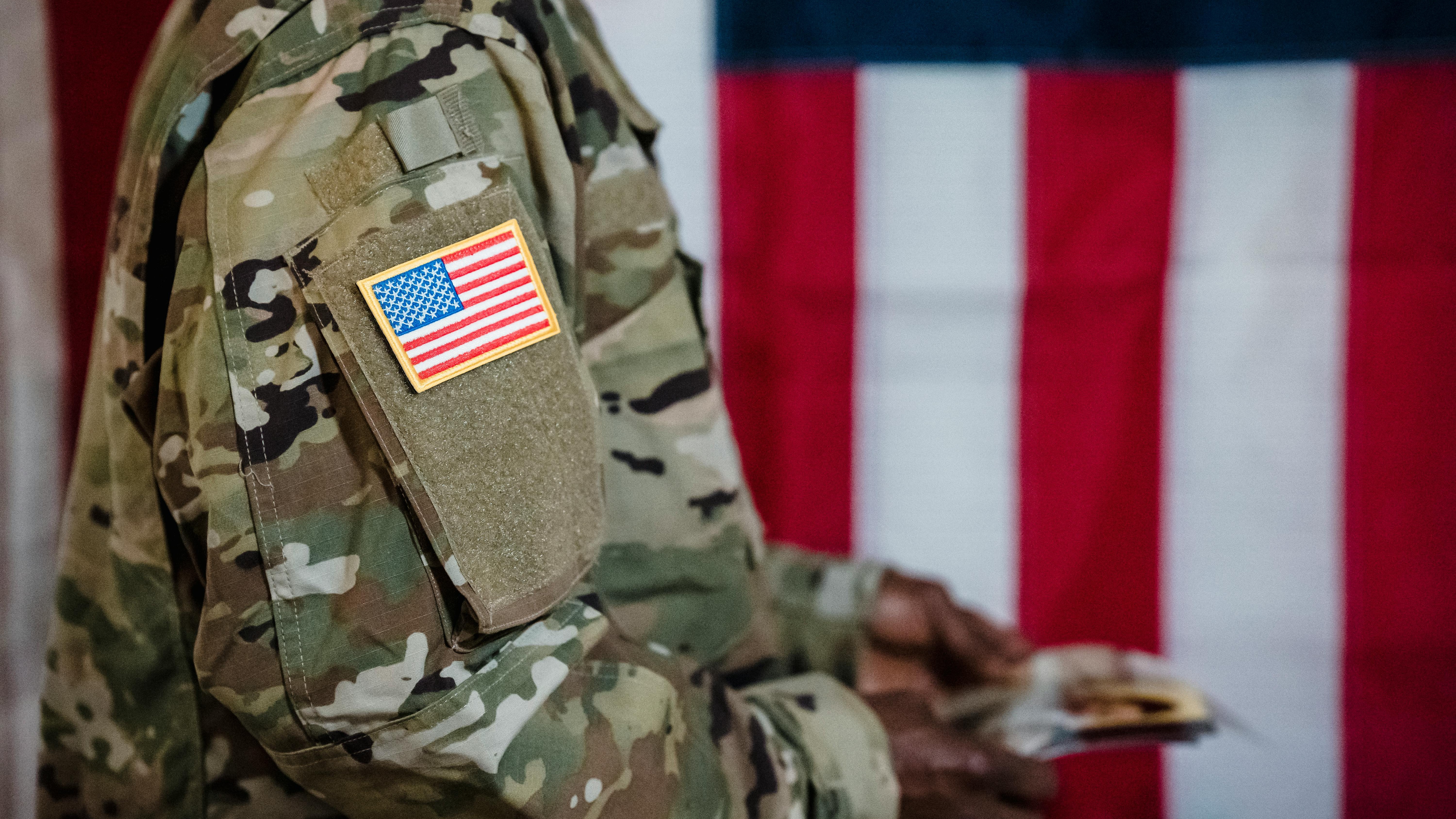 Military spouse entrepreneur focused on a startup laptop