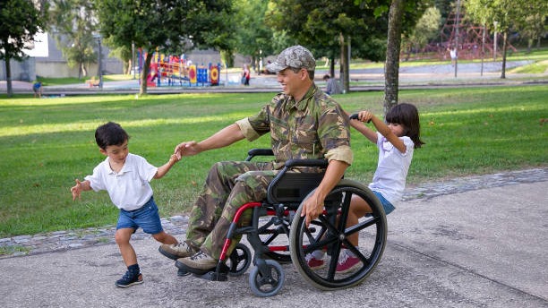 Smiling US Army Veteran in wheelchair, exemplifying Veteran Stories of Courage.