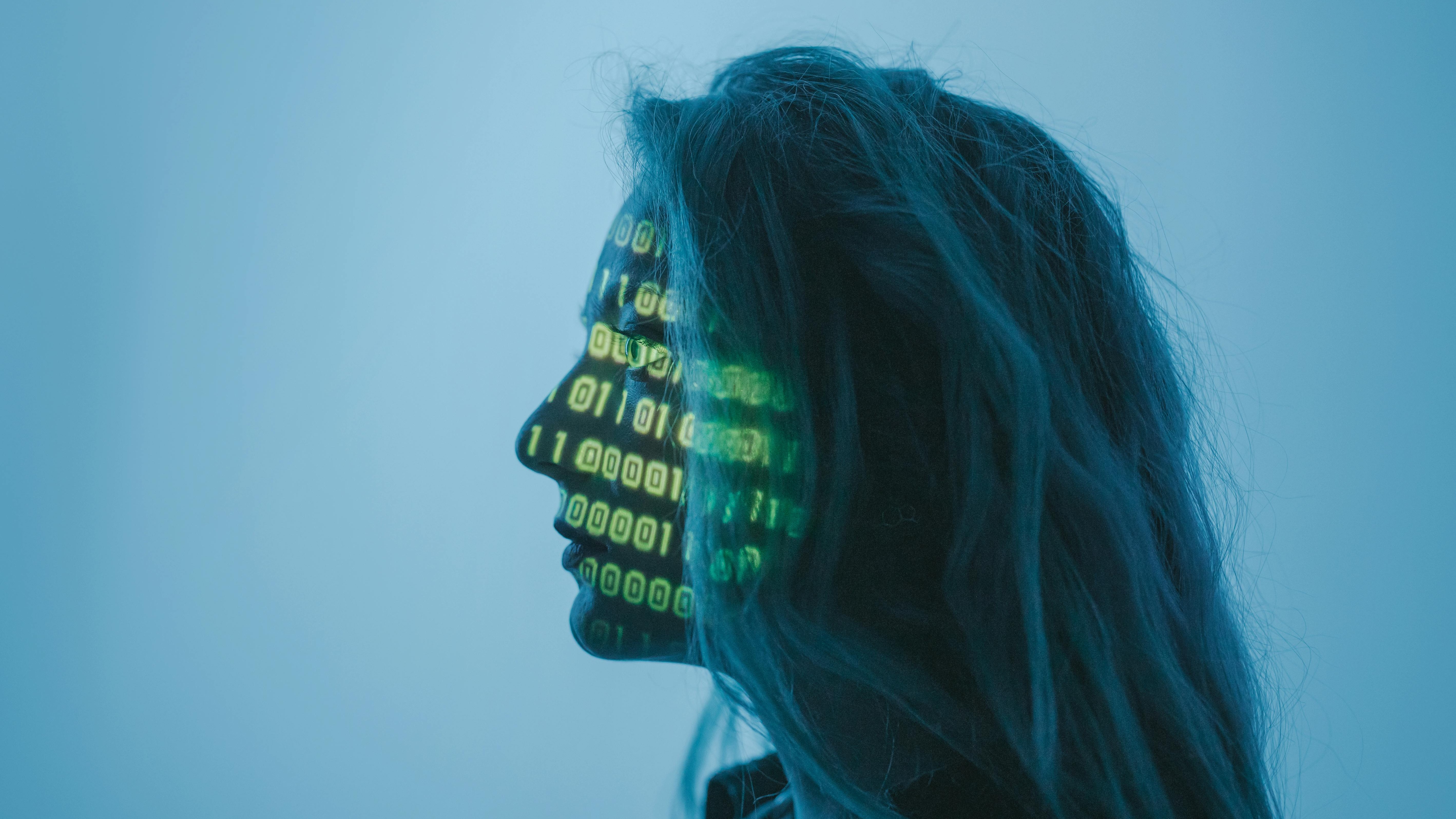 Agentic AI in HR hologram with business professional.