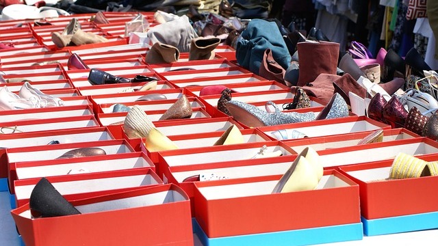 Volunteers unloading boxes during San Antonio community events.