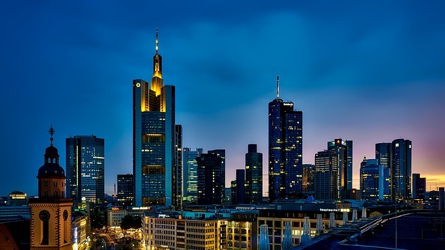 Vibrant city triptych showing small-business growth graphs