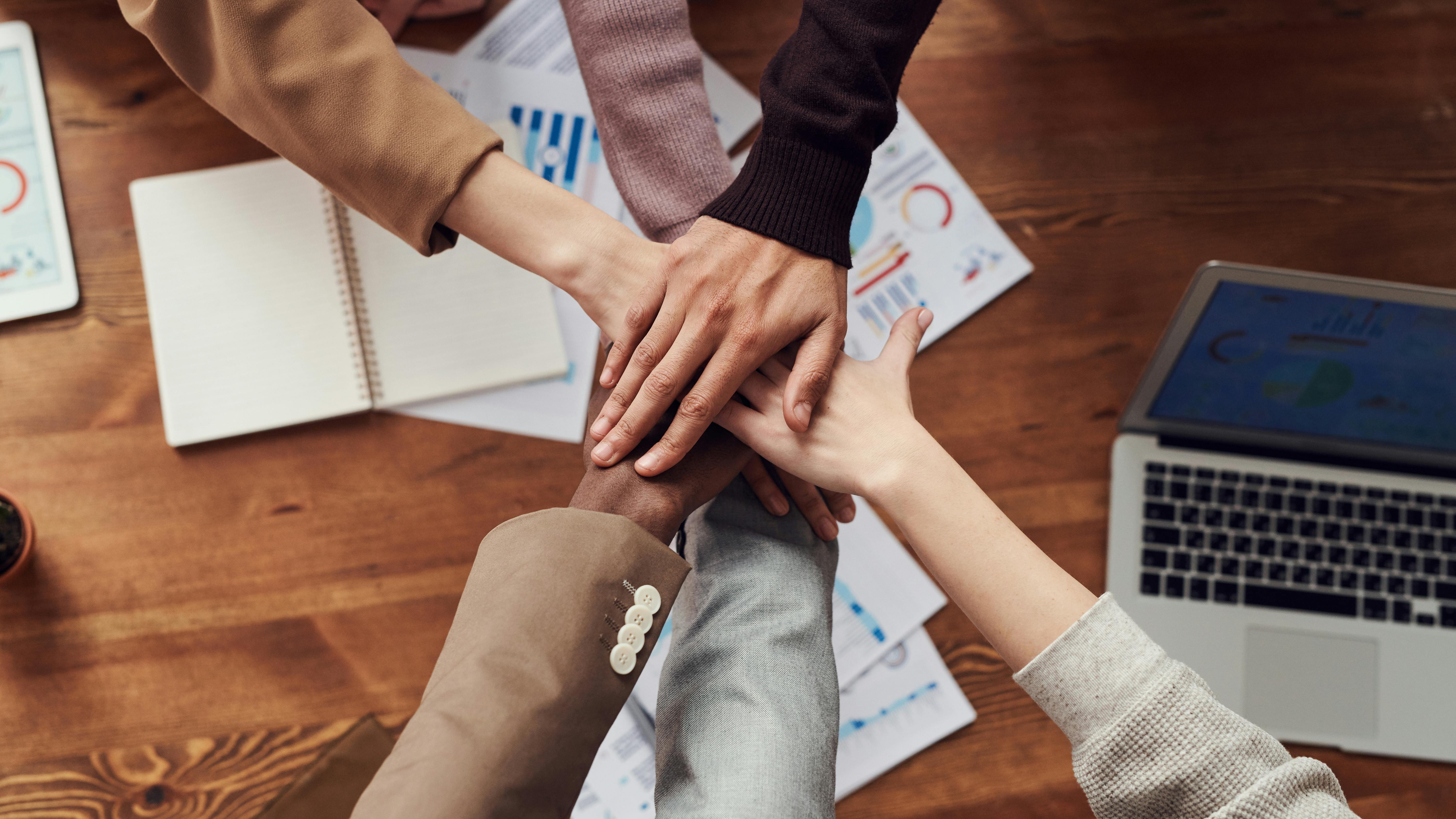 Joyful teamwork in a modern office, happier workplaces leadership transformation.