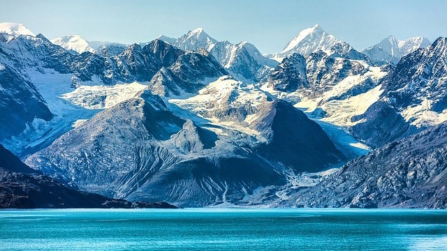 Scenic view of an Alaskan town with boats, highlighting the best internet providers in Alaska.