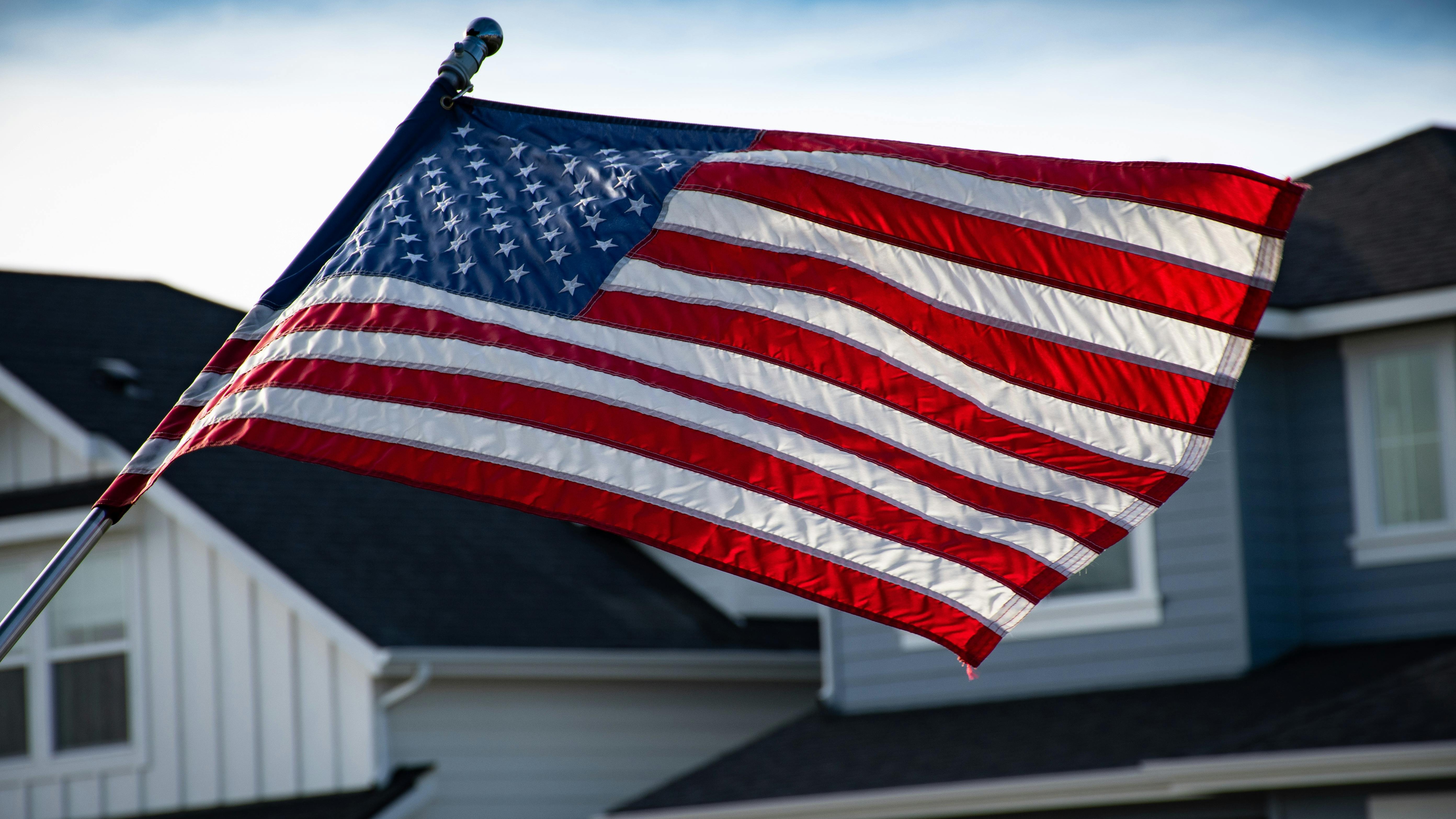 2025 ODNI Reform Act office seal on US flag backdrop.