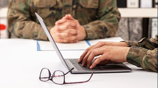 Veterans engage in life changing event discussion at support meeting.