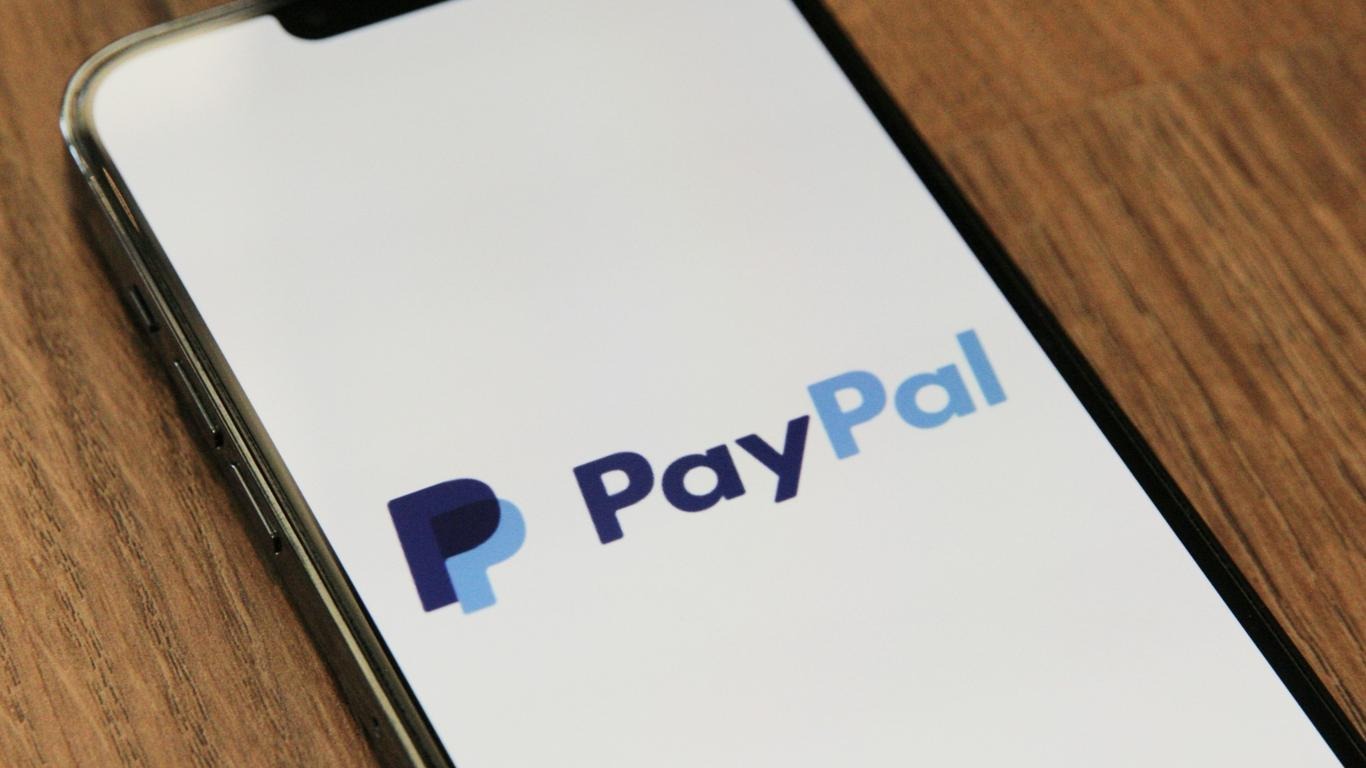 Minimalistic logo design of e-commerce brands on black background.