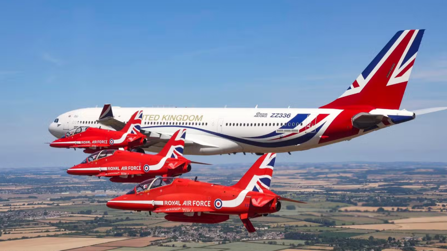 British Air Force One aerial tanker refuels jets over ocean.