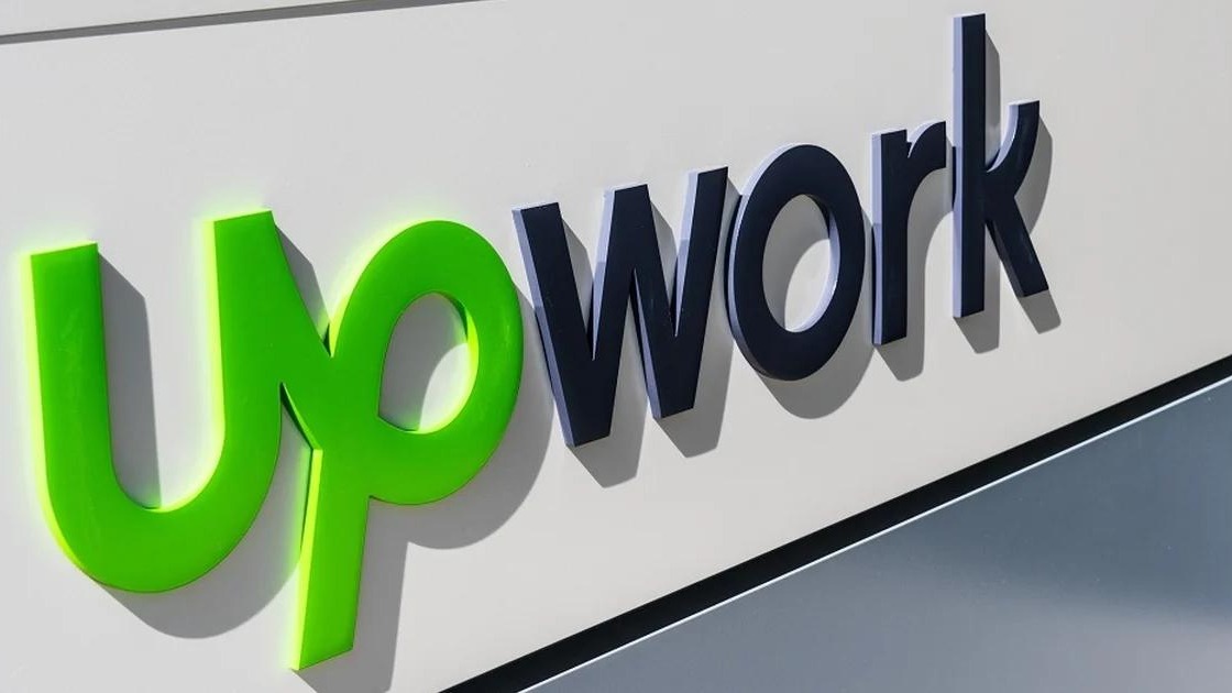 Upwork logo with stock chart background for HR technology.