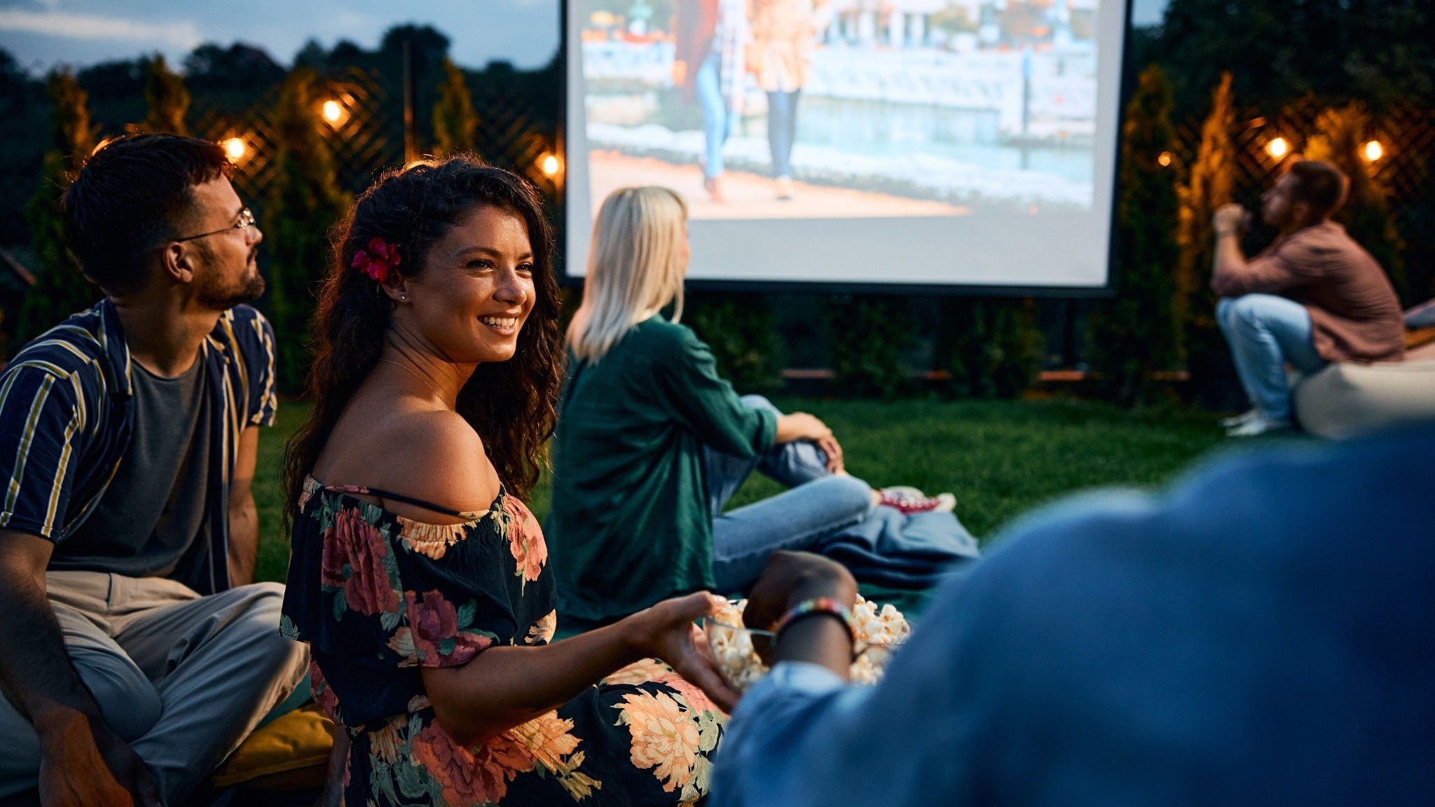 Outdoor family film series in San Antonio at sunset.