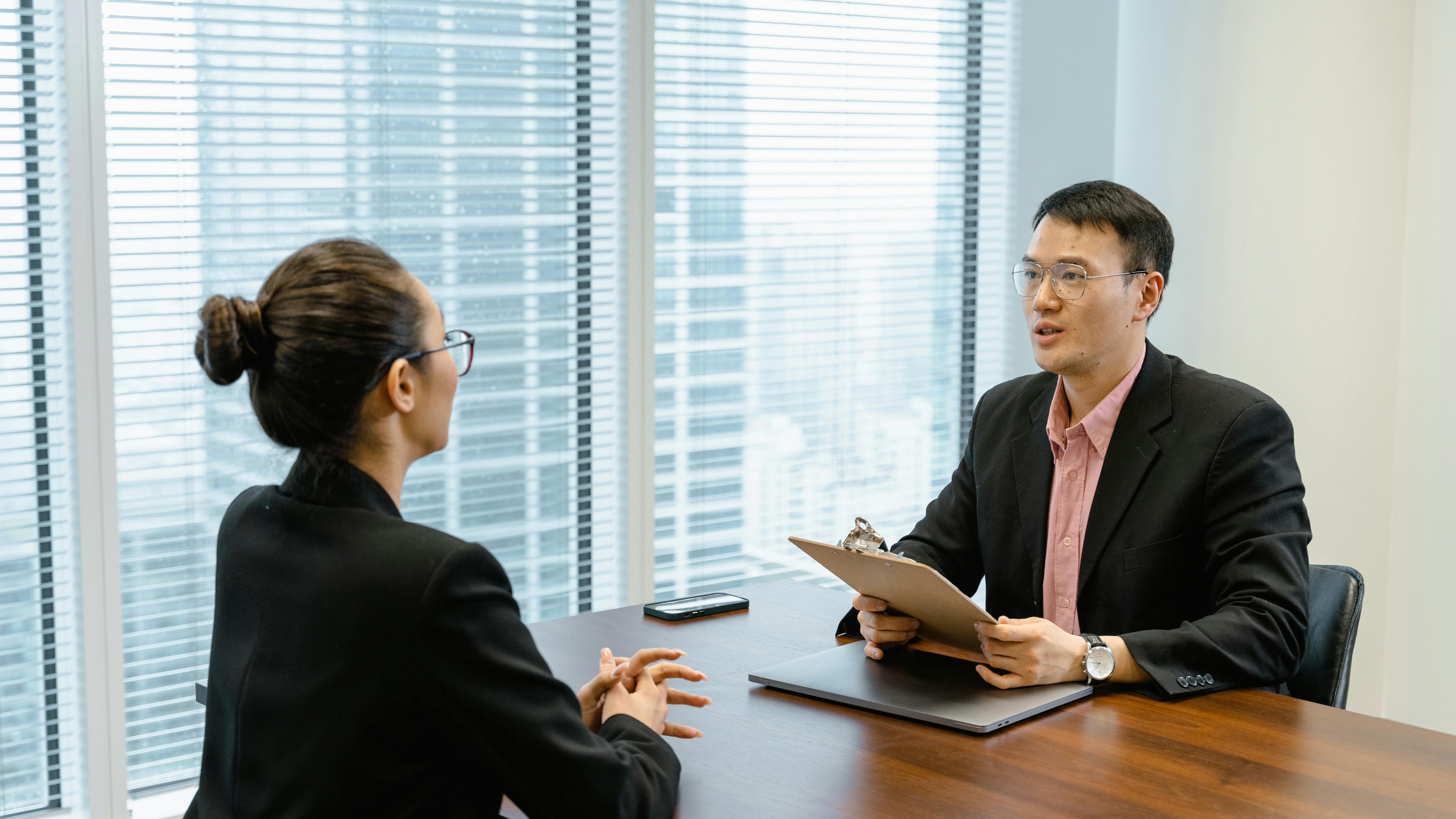 Job interview highlighting citizenship and national origin bias.