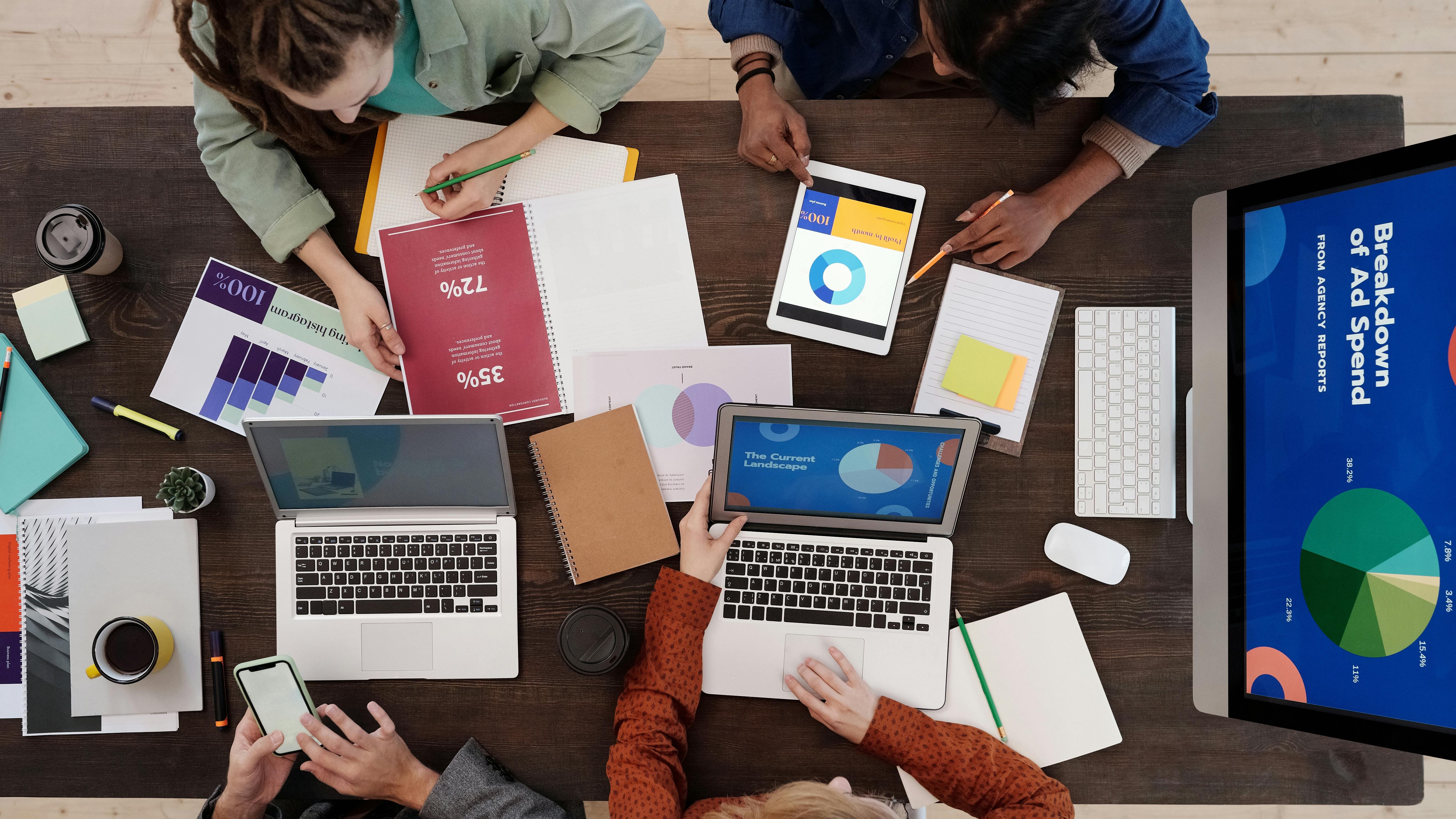 AI in recruiting: Woman using laptop in data center.