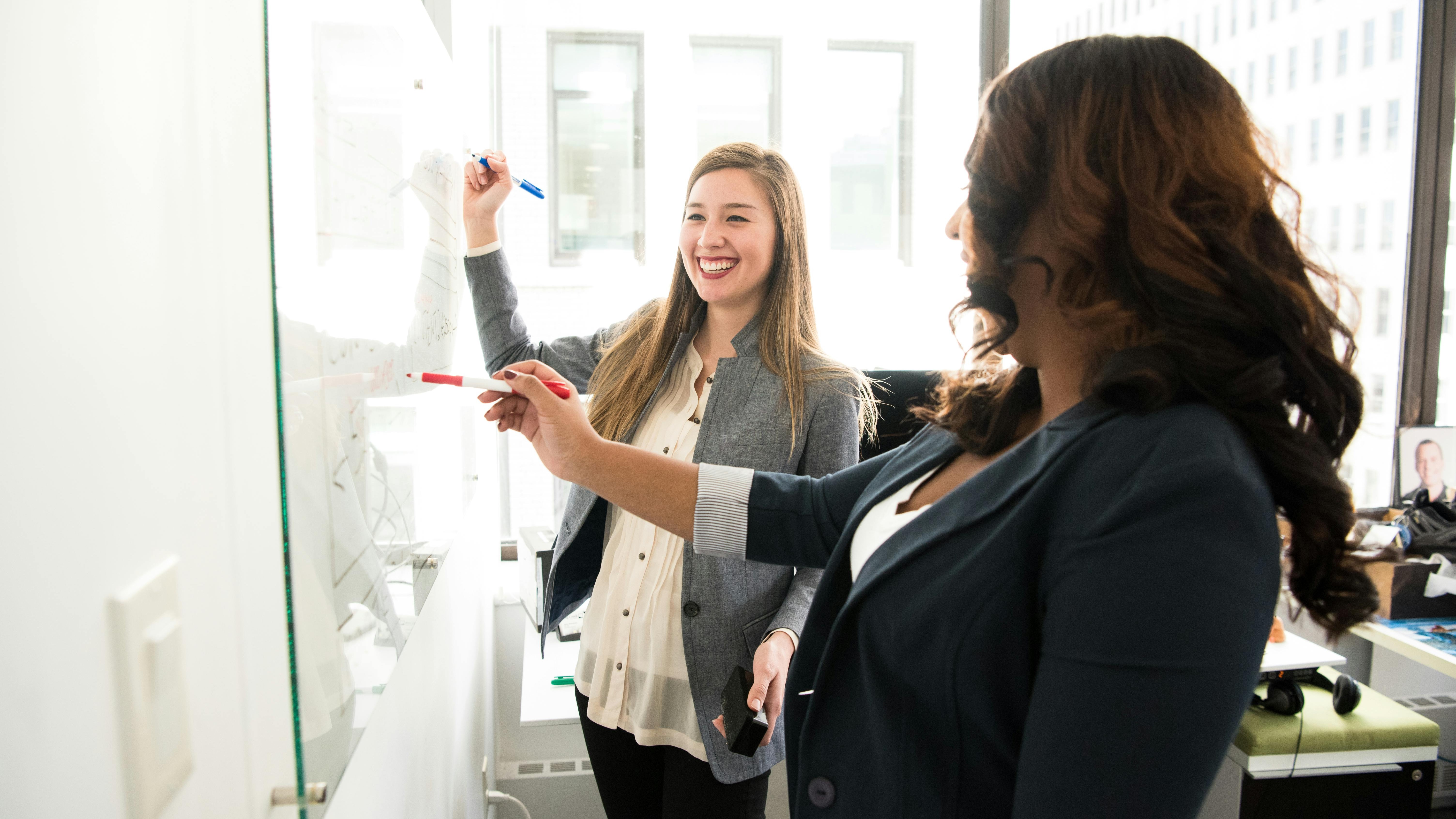 Diverse professionals at Women in Technology at Samsung ERG gathering.