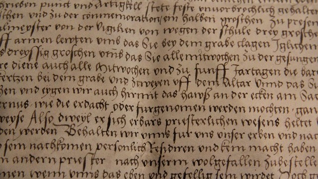 AI revive dead languages concept with a researcher in a library.