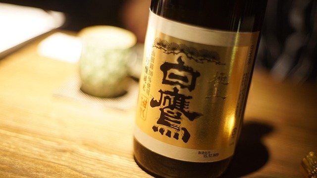 Sake-based RTD drinks elegantly displayed in a modern bar.