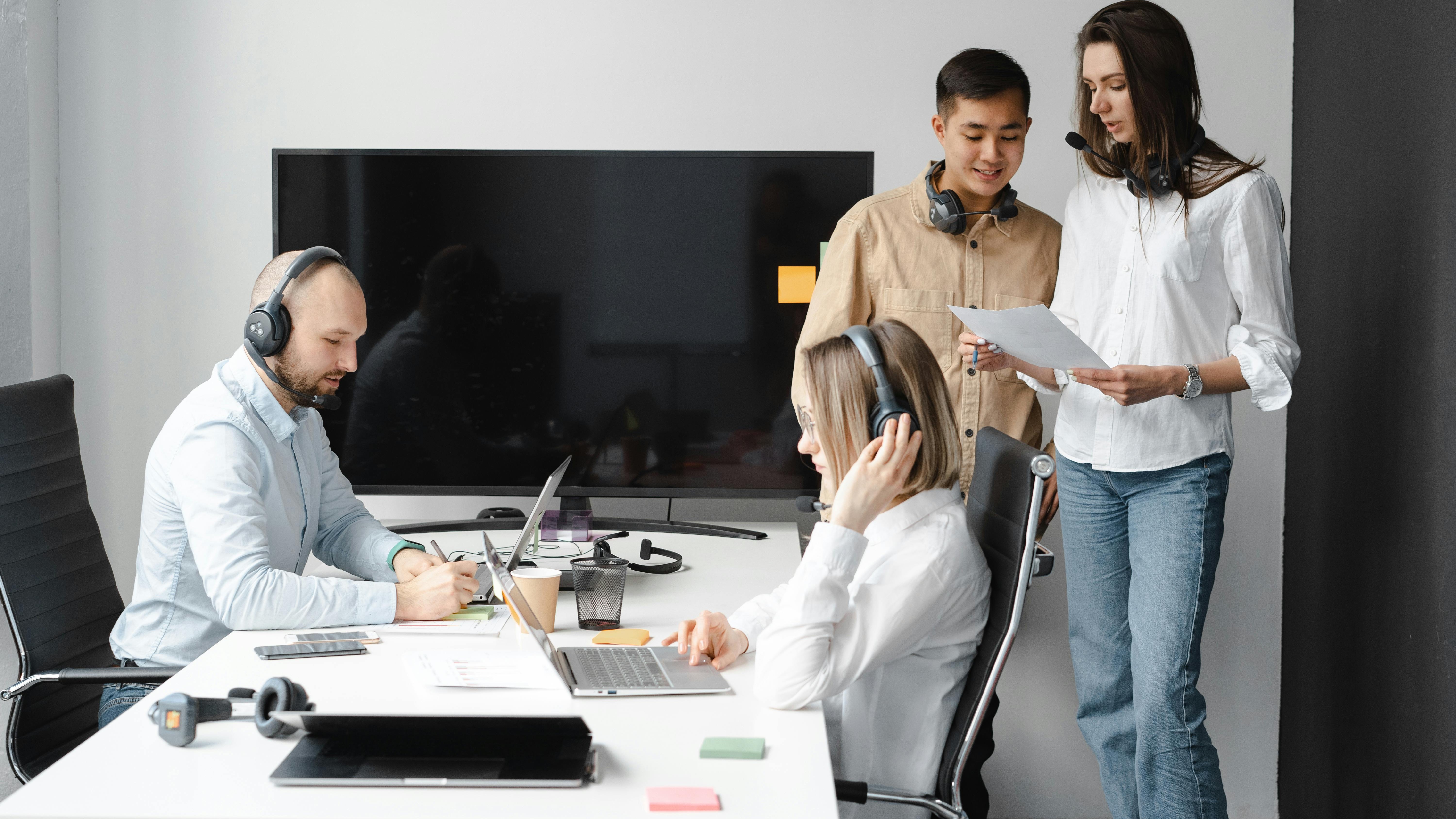 Open office workstations, modern design with collaborative team.