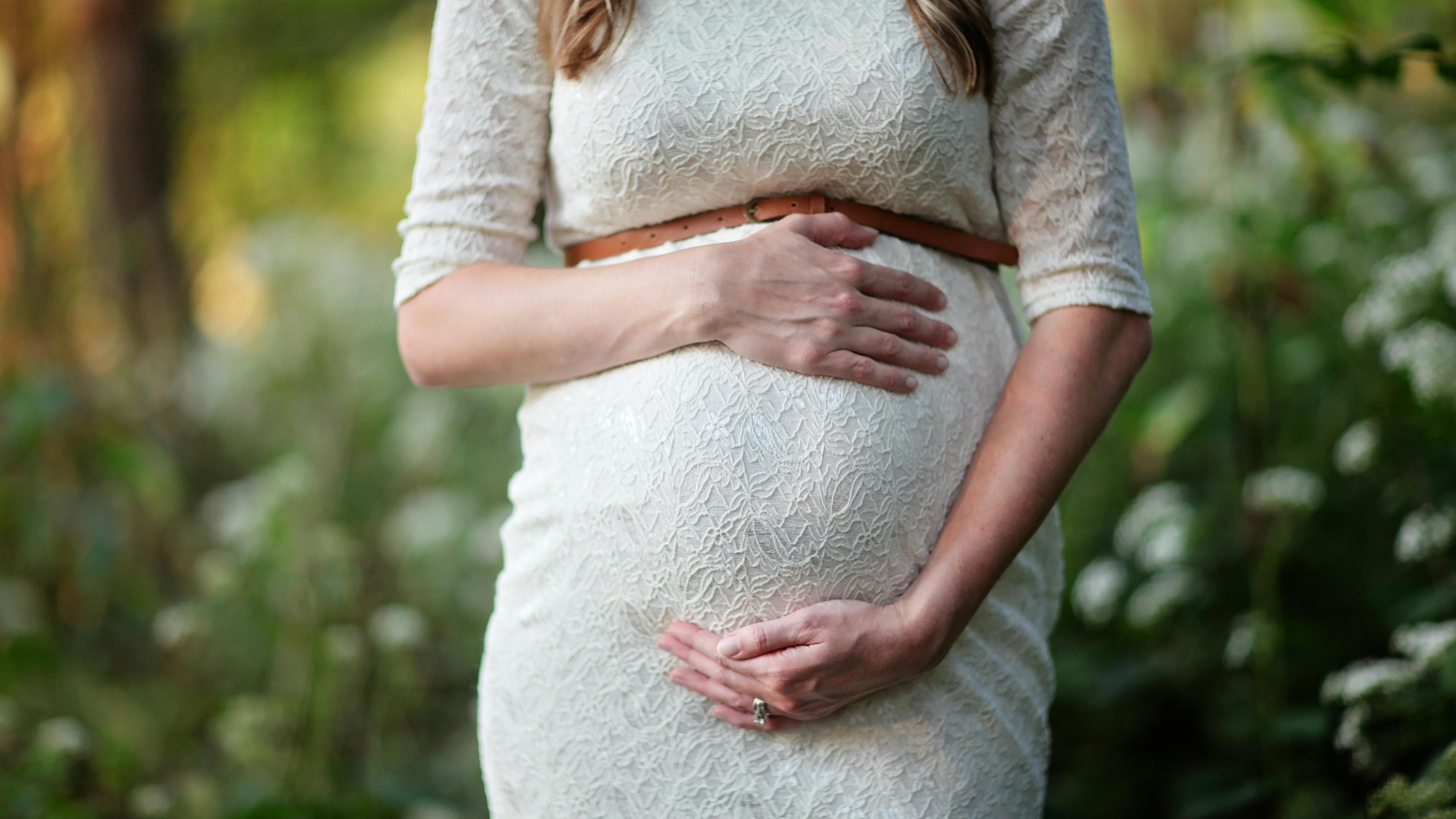 Best of The Bump Awards 2025 winner with mother and newborn.