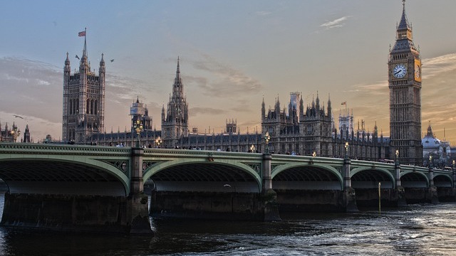 Modern data center with vibrant fiber optics highlighting UK Telecom Infrastructure Challenges.