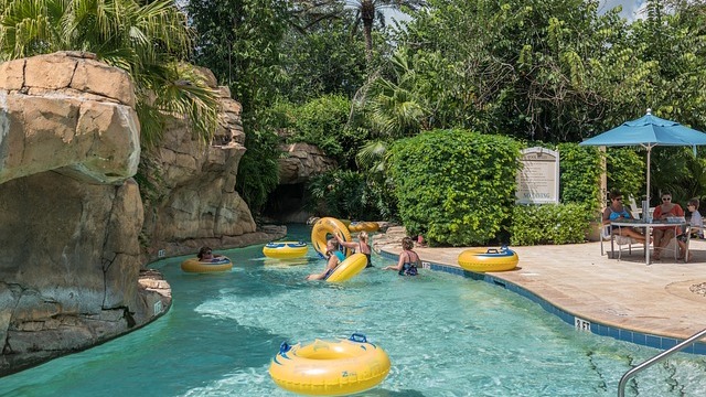 San Antonio water park slide with splashes and families.