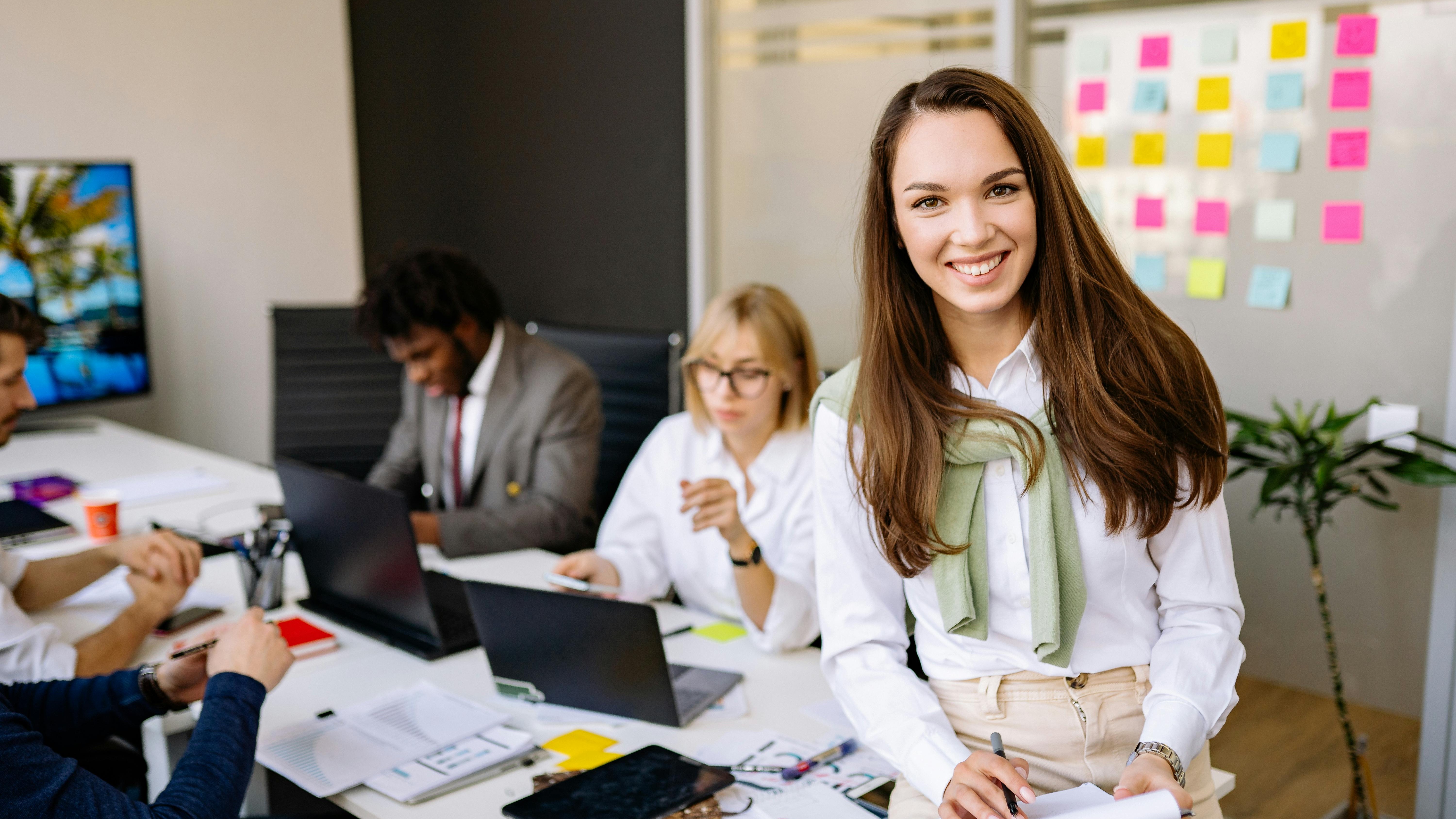 Diverse professionals fostering kindness in workplace culture.