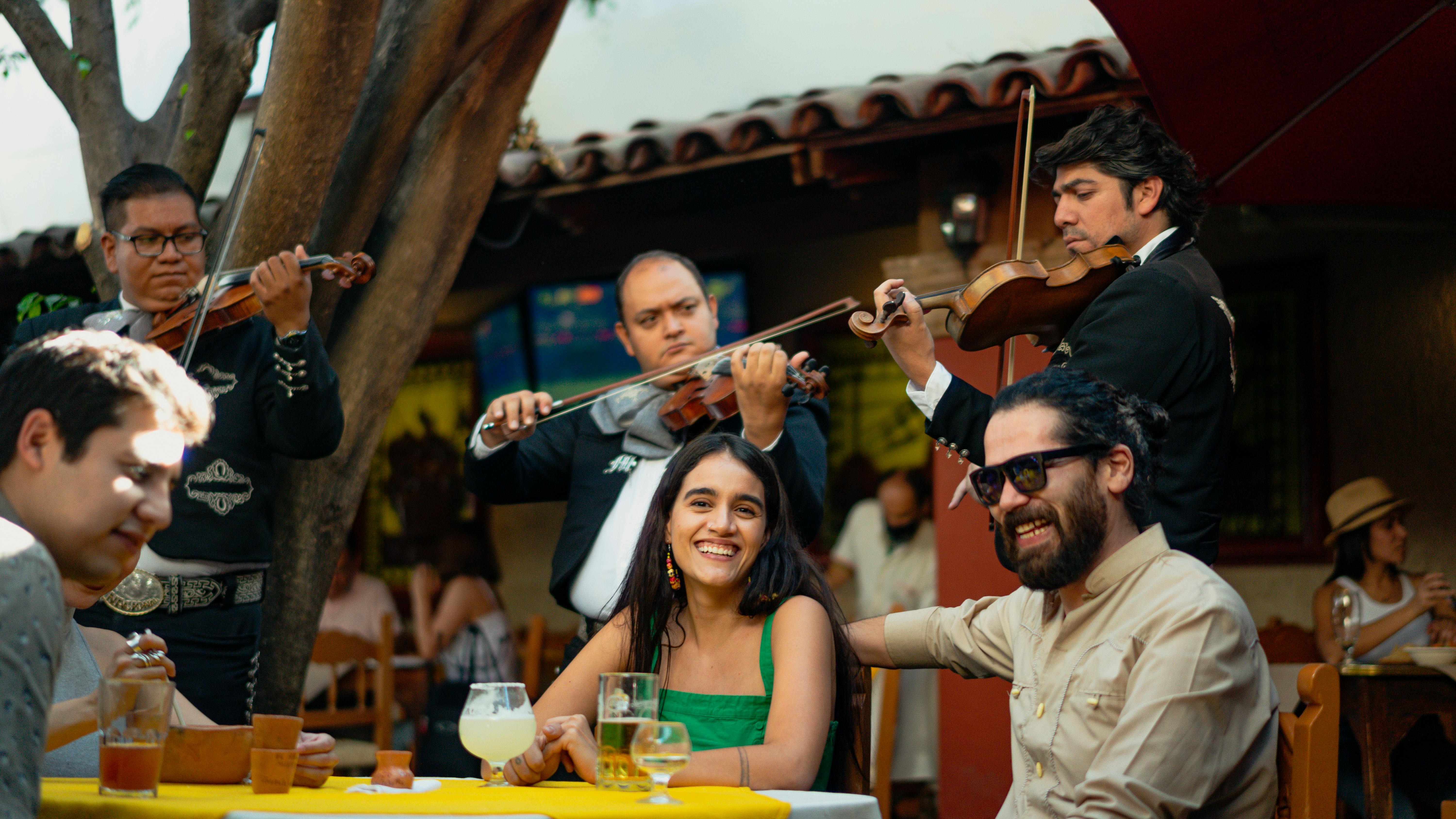 San Antonio family activities at a vibrant city restaurant at night.