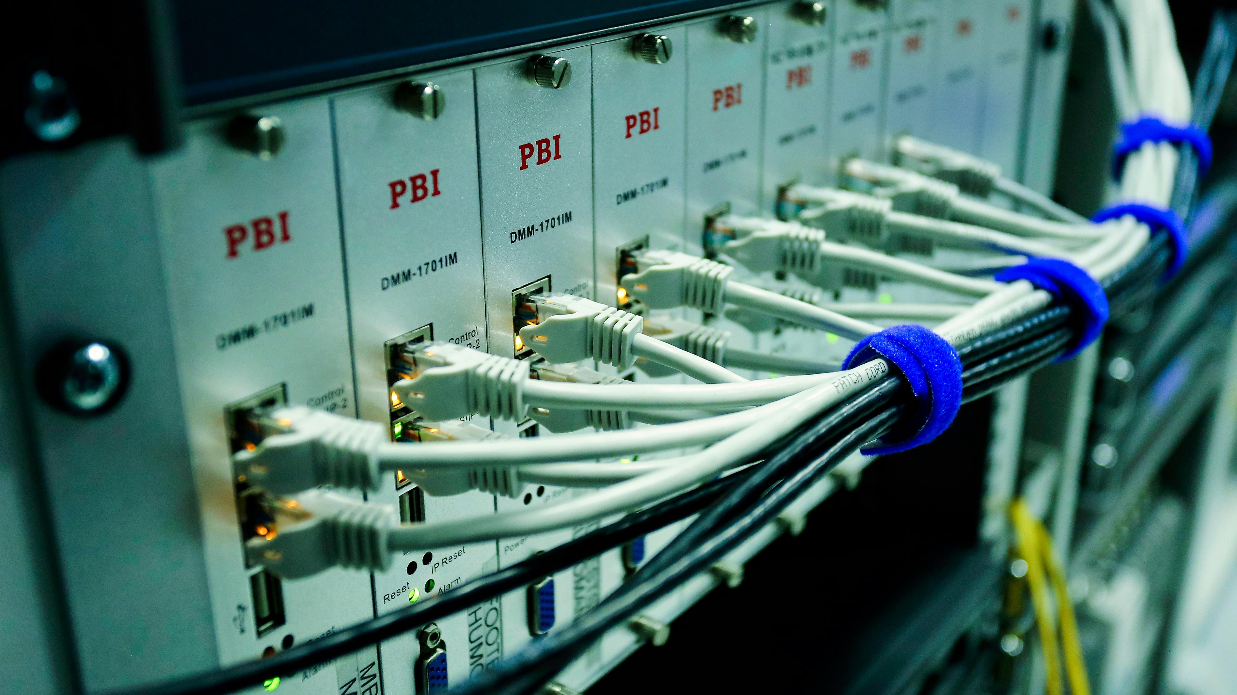 Fiber internet Baltimore expansion with service van in suburban area.