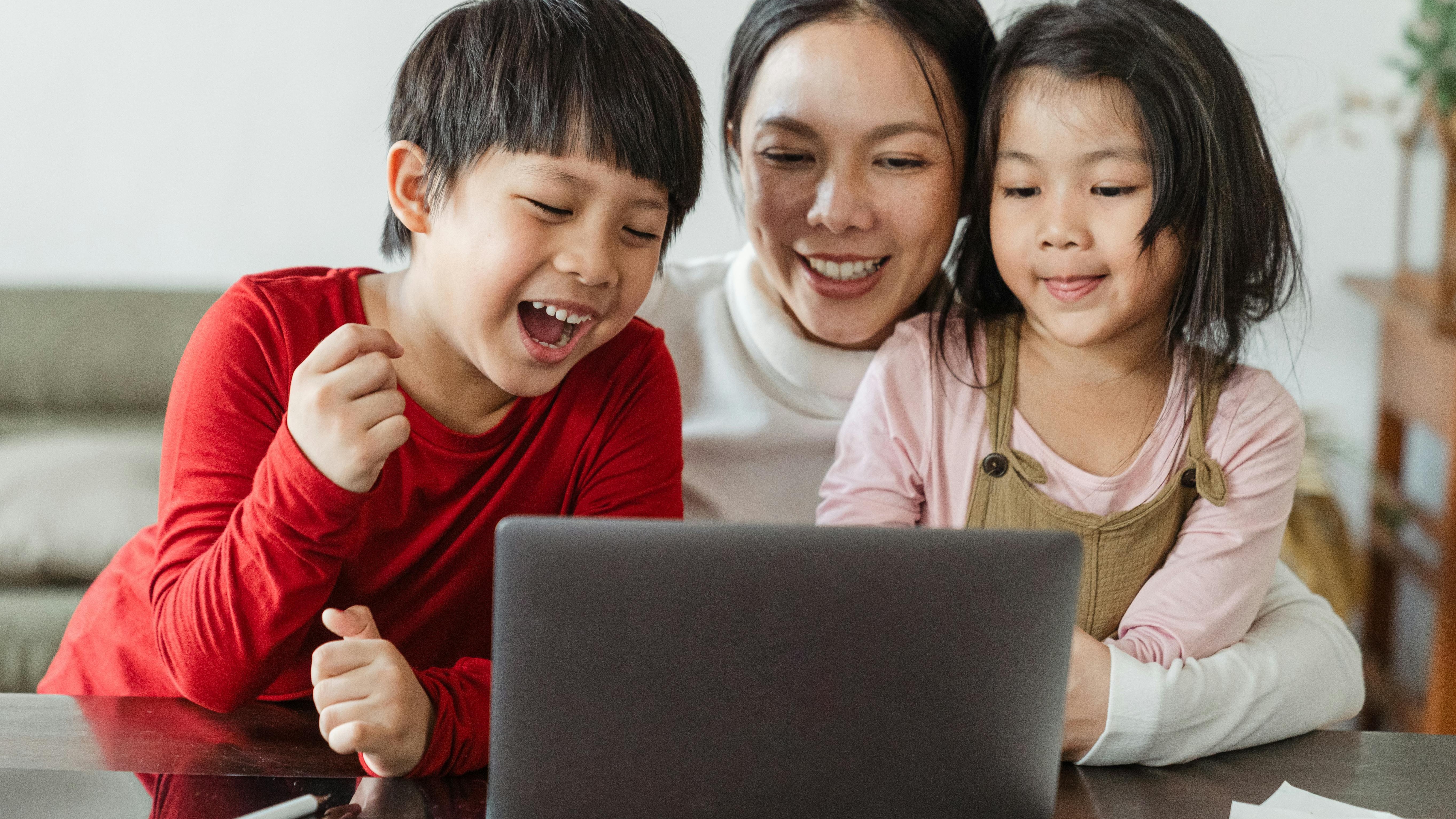 Animated kids playing in CoComelon video for child development.