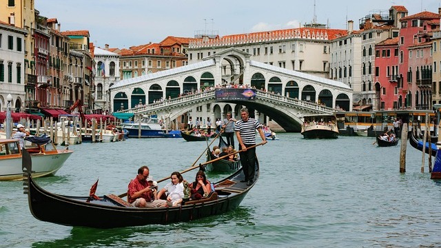 Charming Venetian canal with arch bridge, hidden gems in Venice