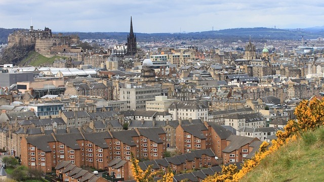 Luxurious hotel room in Edinburgh with elegant decor.
