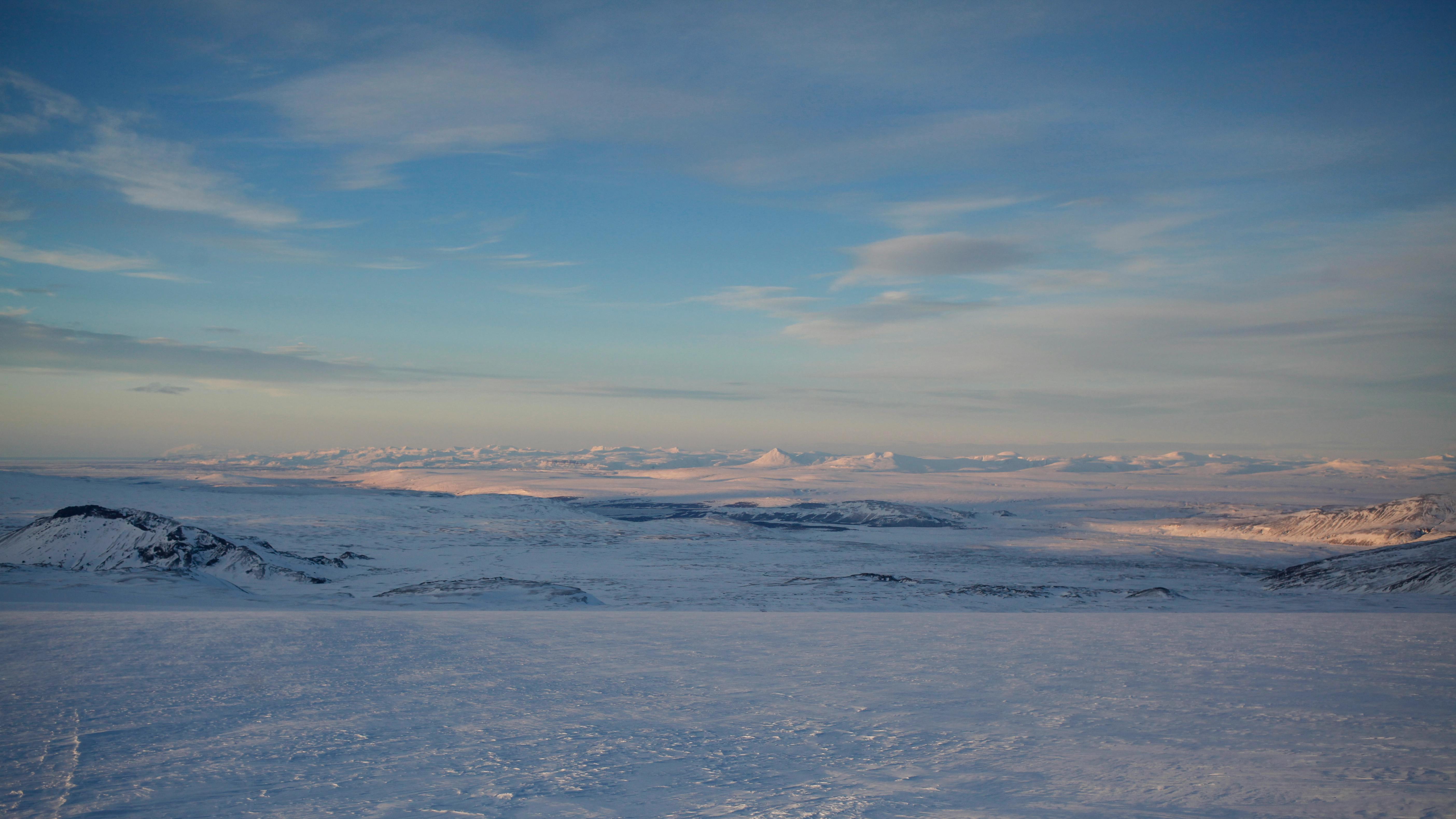 Luxury Travel Insights on Icelandic Glaciers: Sunrise over Langjökull Glacier.