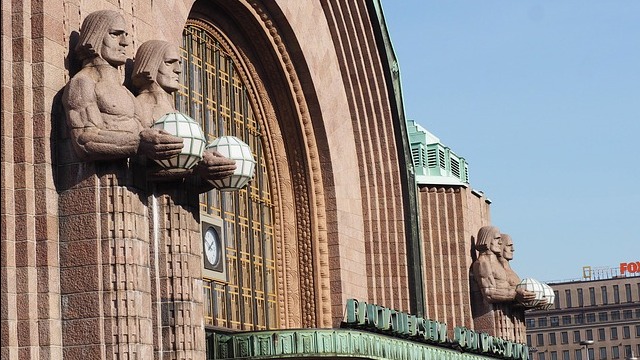Romantic couple in travel podcast promo, luxury honeymoon suggestion in Helsinki.