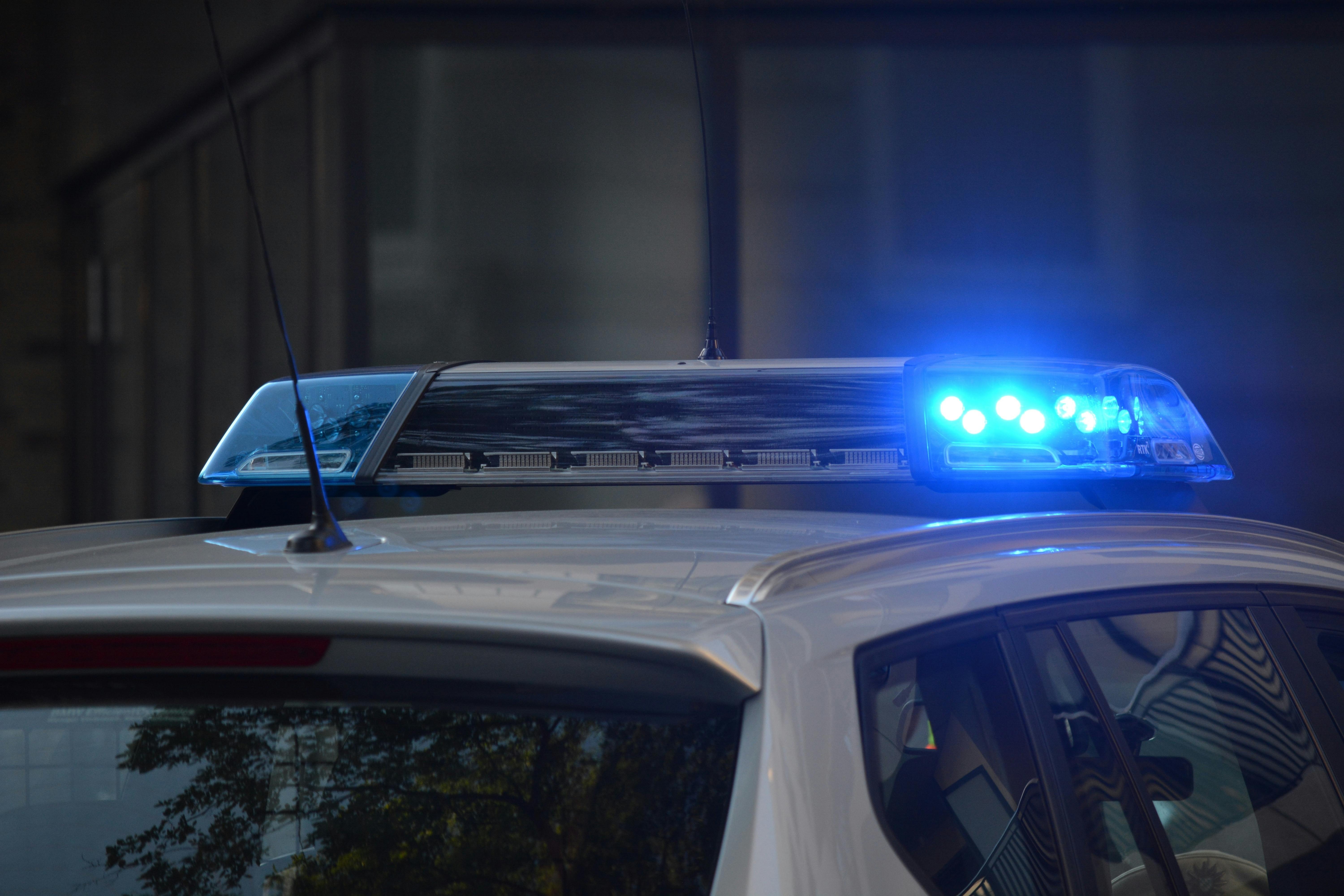 Police investigation tape symbolizing community safety amid Moore County shooting.