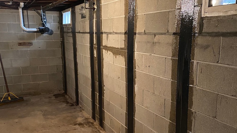 Basement wall before and after carbon fiber foundation repair.