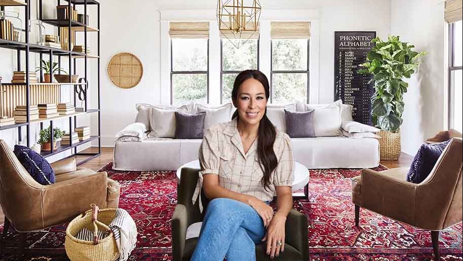 Smiling brunette woman discussing spring decorating tips.
