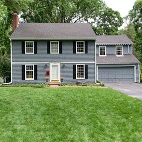 grey house with garage