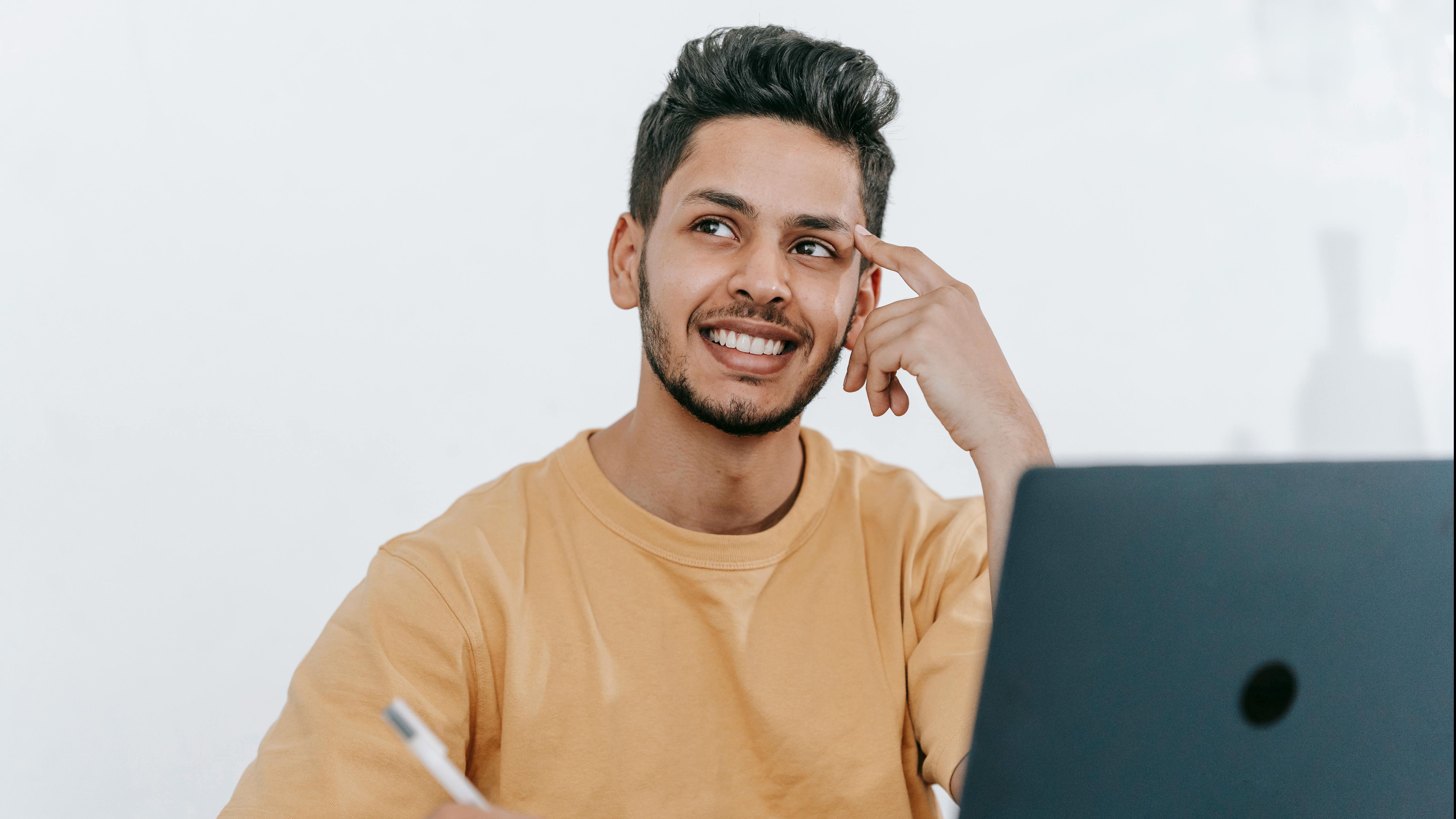 man on laptop, Learn AI for Business Success video platform