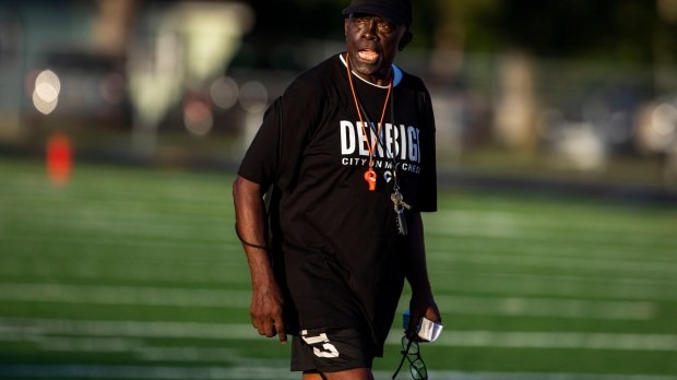 Hampton Roads community coach on a football field