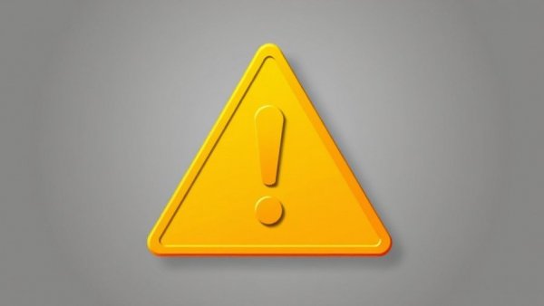 Yellow warning triangle with exclamation mark icon