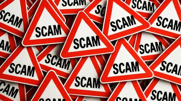 Red triangular scam warning signs symbolizing Medicare scam calls.