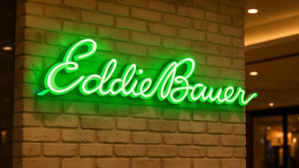Neon Eddie Bauer sign at New Jersey store closure location.