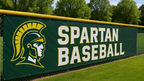 Sparta baseball 2026 season fence with Spartan logo and text.