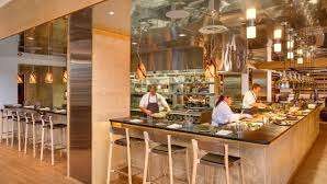 Vibrant dining scene at night representing culinary delights in Greenville SC.