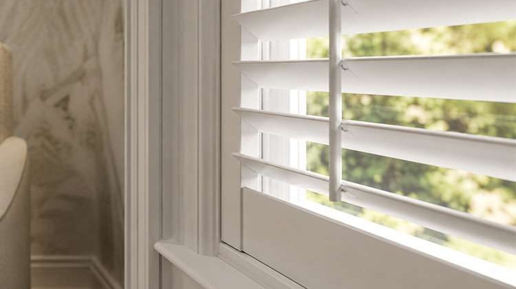 Close-up of plantation shutter louvers used for light and heat control