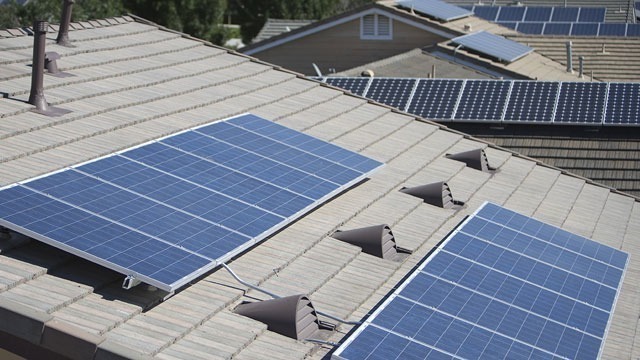 solar panel installation on multiple tile roofed homes gvs design and build construction