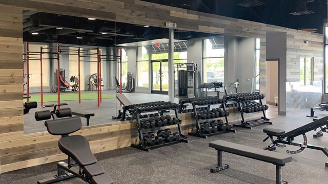 finished gym renovation with gym equipment by commercial general contractor gvs design and build construction