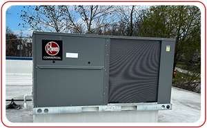 Large commercial HVAC unit on the rooftop of commercial building