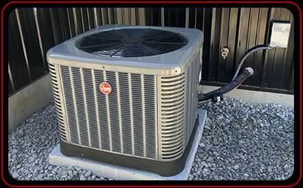 Heat pump installation along side building Central Kentucky
