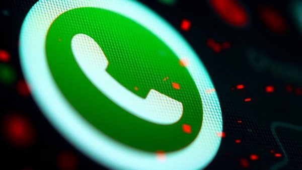 Blurred WhatsApp logo with notification on digital screen, WhatsApp Security Features.