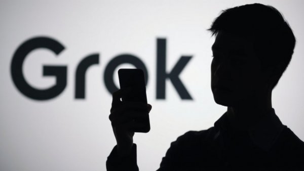 Silhouette using smartphone with Grok logo, AI Undressing Technology