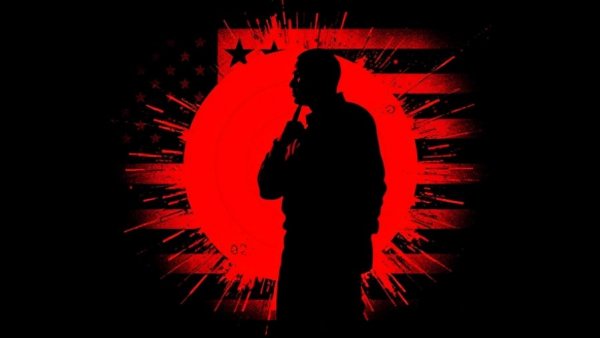 Conceptual art of silhouetted figure with target overlay and American flag, symbolizing data brokers and violence.